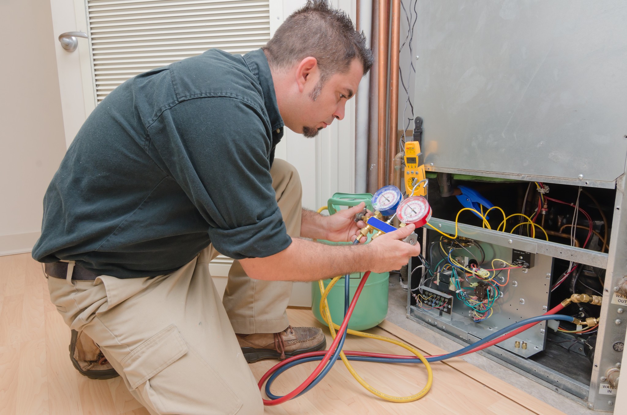 bigstock-Hvac-Technician-Working-69022546 bigstock-Hvac-Technician-Working-69022546